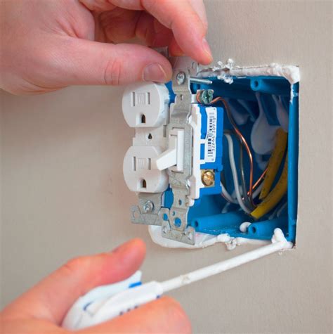 caulking a hole in a electrical box|how to seal electrical boxes.